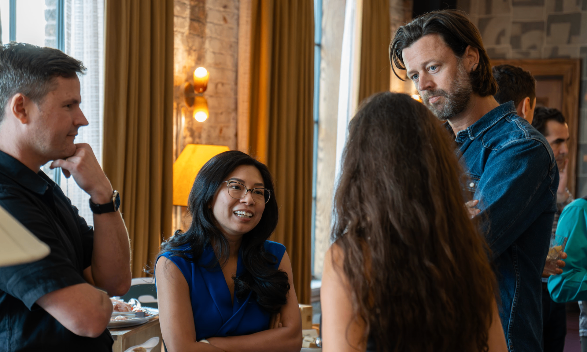 Entrepreneurs networking and discussing at VIP event